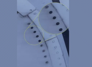 Flight to NYC Cancelled After Passenger Discovers Missing Bolts on Plane Wing